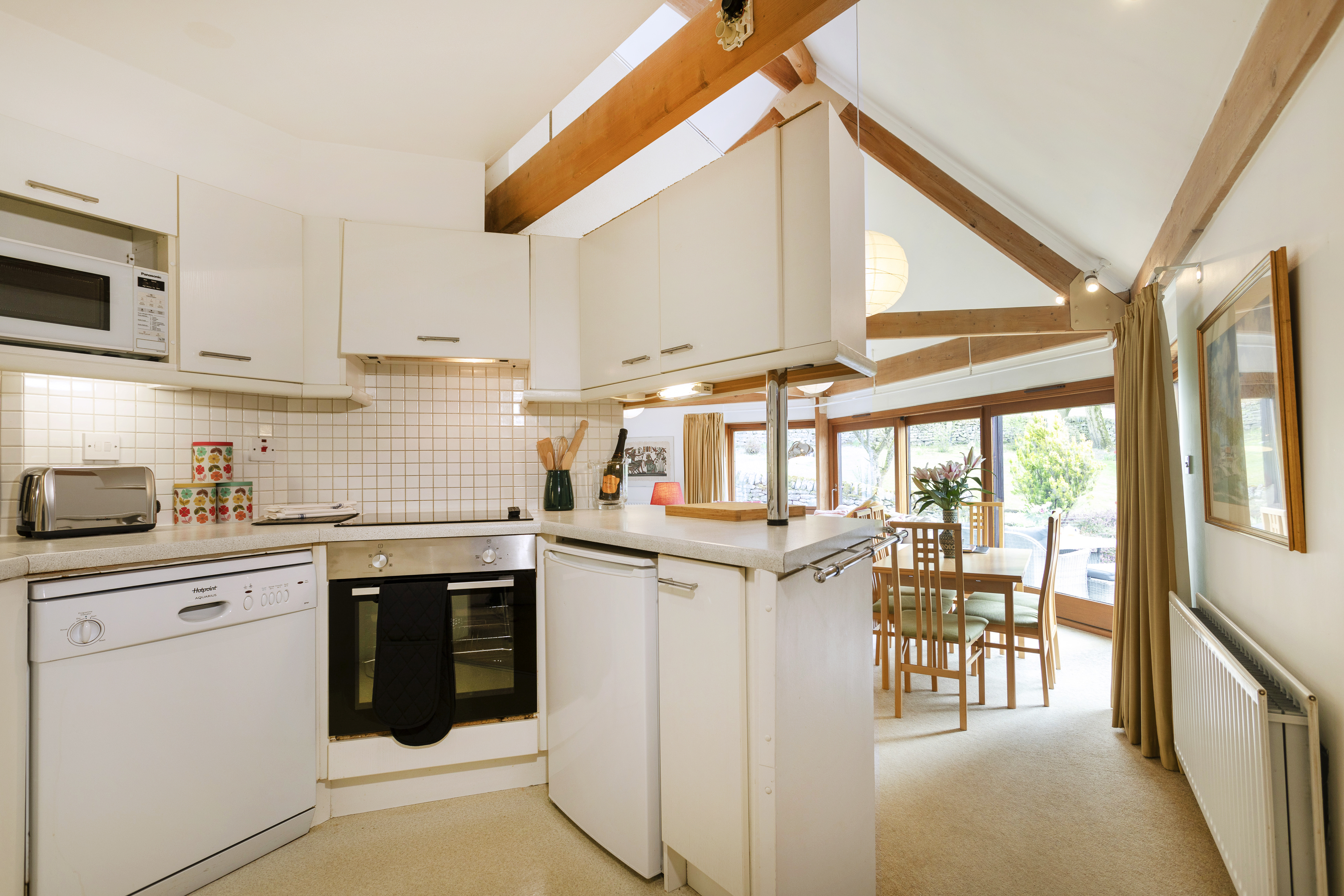 The kitchen at The Round House, vaulted beam ceiling