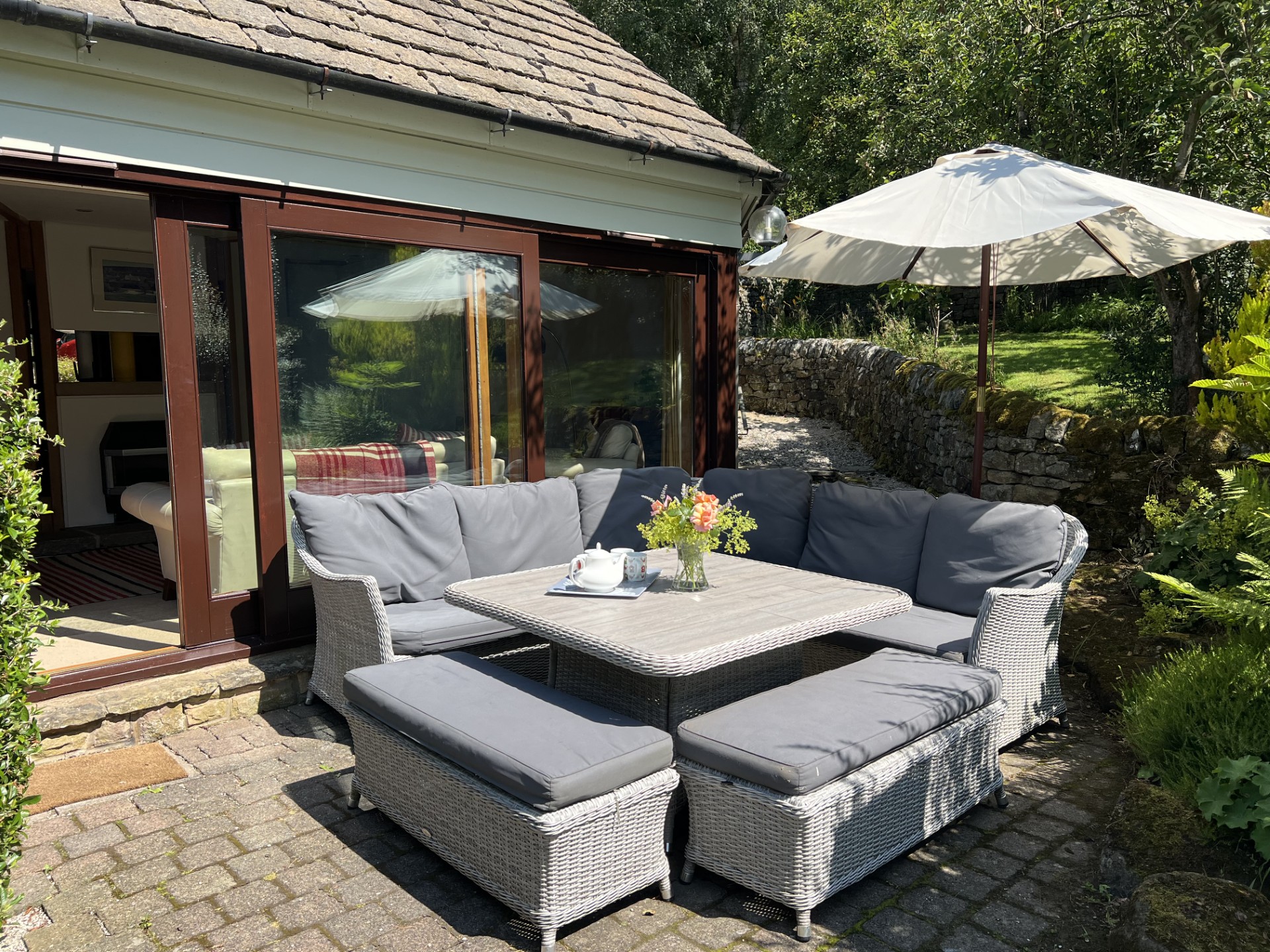 The private terrace and outdoor seating at The Round House