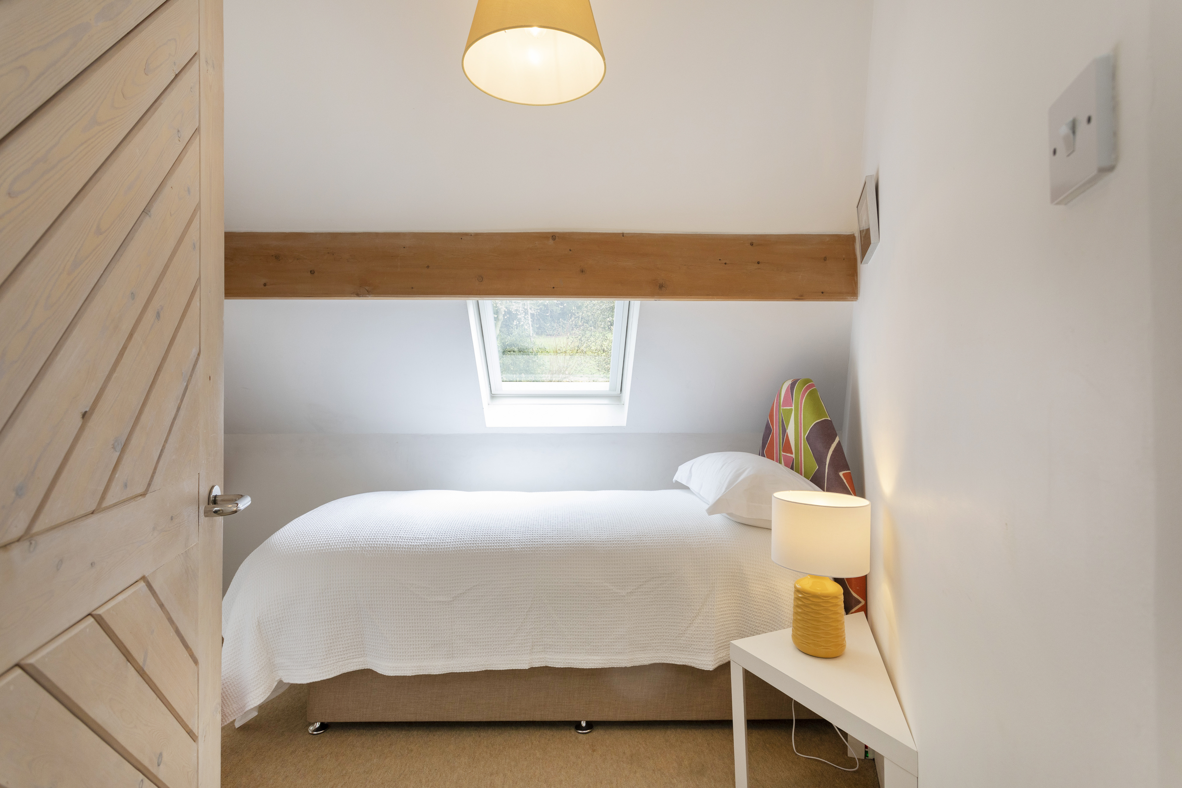 The single bedroom upstairs at The Round House